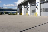 an asphalt lot with a parking area in front of it, showing various types of parking areas