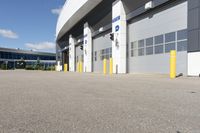 an asphalt lot with a parking area in front of it, showing various types of parking areas