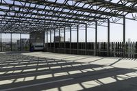 the inside of an industrial building with a lot of glass and steel in it,