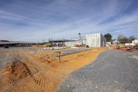 an industrial site that has some concrete walls and cement walls and some dirt in it