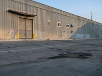 Industrial Storage: Shadows and Vegetation Enhancing the Landscape