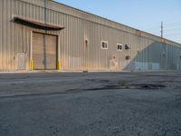 Industrial Storage: Shadows and Vegetation Enhancing the Landscape