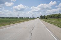 Iowa Road Through Asphalt Field in Bancroft