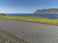 Island Horizon: Clear Sky and Calm Waters