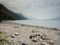 Italian Beach: A Stunning Lake View with Clouds