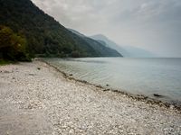 Italian Beach: A Stunning Lake View with Clouds