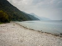 Italian Beach: A Stunning Lake View with Clouds