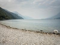 Italian Beach: A Stunning Lake View with Clouds