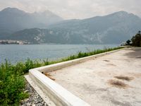 Italy Scenic Road with Lake and Mountains View