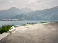 Italy Scenic Road with Lake and Mountains View