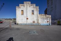 a picture of an old building and some other stuff that is in an abandoned area