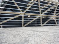 a close up view of the side of the building with metal bars and stairs up