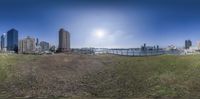 this is an aerial panorama of the city in daylight time with a blue sky and clear skies