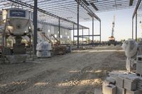 the large building is being built with concrete and construction equipment in progress to make way for a new construction project