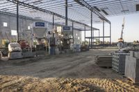 the large building is being built with concrete and construction equipment in progress to make way for a new construction project
