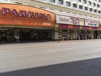 parking is a feature in the new movie theater's opening night displays below a marquee