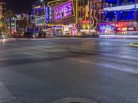 Las Vegas at Night: Streets Illuminated by Dark Neon Lights