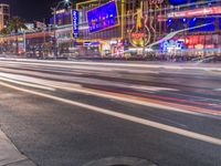 Las Vegas at Night: Streets Illuminated by Dark Neon Lights