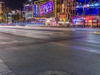 Las Vegas at Night: Streets Illuminated by Dark Neon Lights