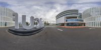 this building has been designed in a circular view with the letters'u s'on the front of the building