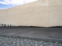 the building with a small area and a few columns is very wide in the middle of the stone