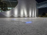 Lisbon Night: Artificial Light on Cobblestone Streets