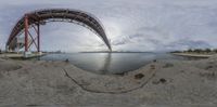 the fish eye lens view shows a bridge as it's in motion through the water