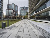 a walkway is set in front of tall buildings at the park of dreams in washington, dc