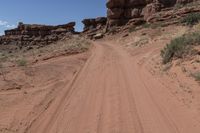 dirt and rocks are on the trail at the edge of a desert area in arizona