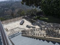 a skateboarder riding down some stairs in the city of los angeles, californs