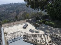 a skateboarder riding down some stairs in the city of los angeles, californs