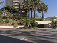 the intersection where there is a parking garage on the side of the road on top of a building