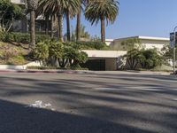 the intersection where there is a parking garage on the side of the road on top of a building