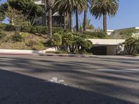 the intersection where there is a parking garage on the side of the road on top of a building