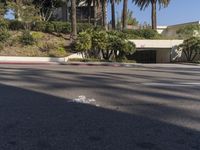 the intersection where there is a parking garage on the side of the road on top of a building