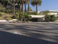 the intersection where there is a parking garage on the side of the road on top of a building