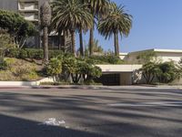 the intersection where there is a parking garage on the side of the road on top of a building