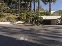 the intersection where there is a parking garage on the side of the road on top of a building