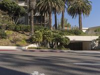 the intersection where there is a parking garage on the side of the road on top of a building