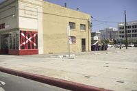 a business called axx with signs on the side of the road next to it