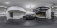 a 360 - view image of a small car in the garage of a large building