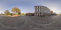 a 360 - ray is a view from a fish eye lens lens on a plaza,