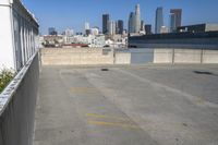 view of the city from a building with no parking spaces and a sign saying'be quiet for everyone who has come to know you