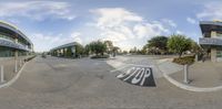 a large street is shown in this fish eye view photo of two buildings on each side