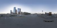 a wide angle view of cityscaping in the evening sky, with no cars and no vehicles