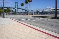 the crosswalk is empty and has several signs on it for pedestrians to know where it is