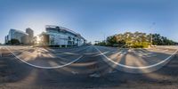 this is a panorama view of a road taken in the city center of a big city