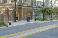 there are two empty sidewalks on the sidewalk near a store in a big city