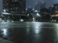 Los Angeles City Skyline at Night with Modern Architecture and Reflecting Water