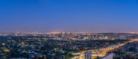 view of the city from a building in hollywood hills at dusk, california, usa